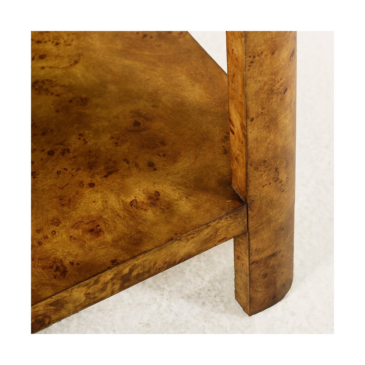 Art Deco burl side table lower shelf detail.
