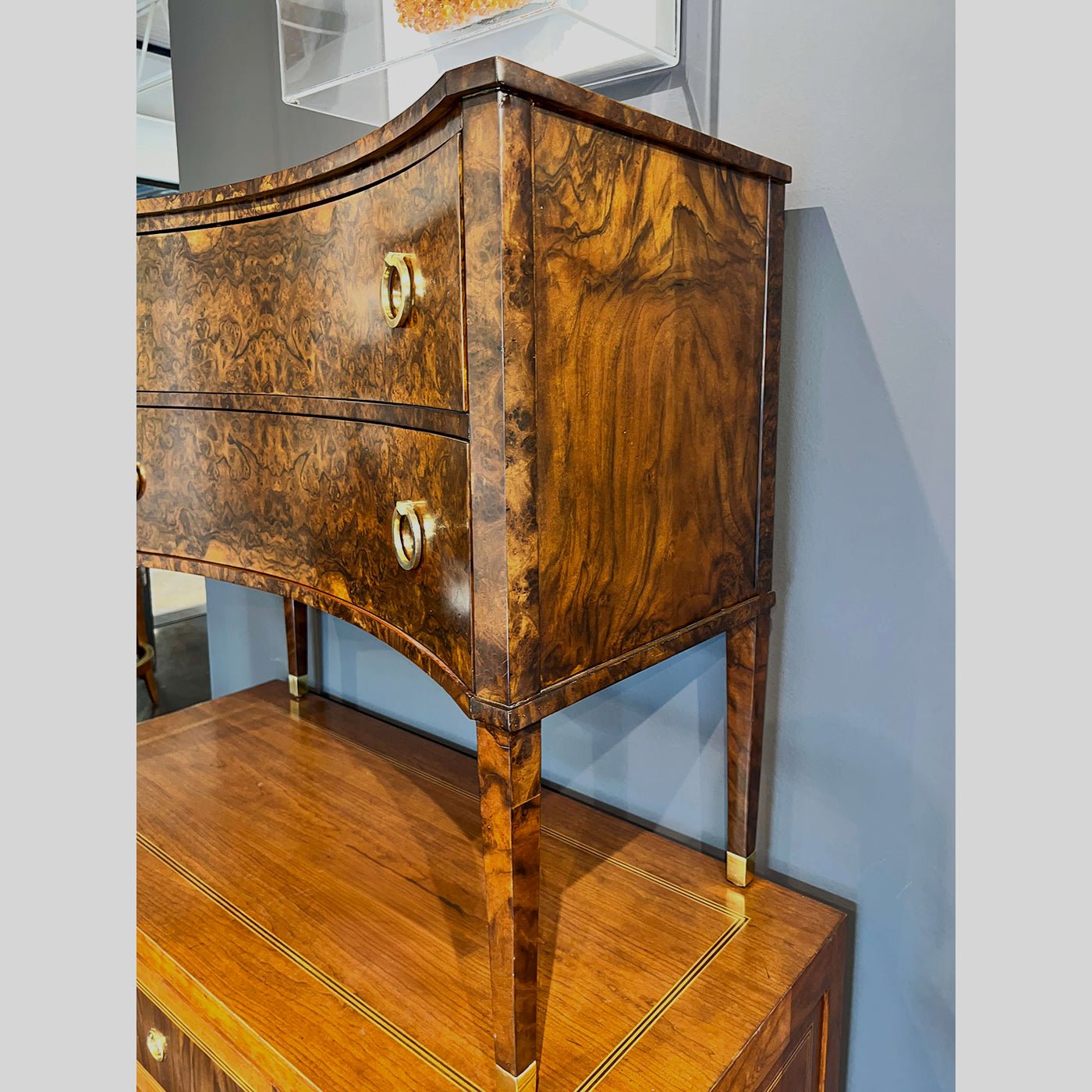 Side view highlighting wood grain and leg details.