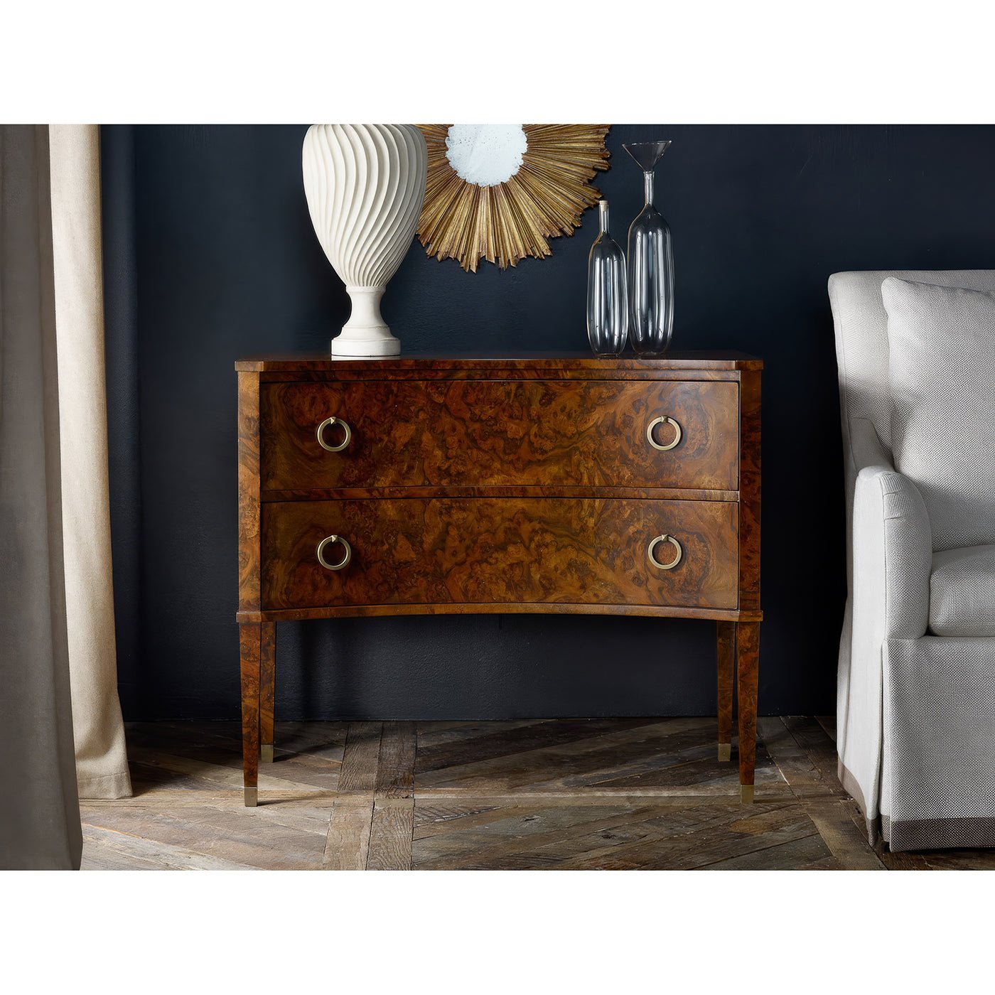 Walnut chest placed in living room setup with decor.