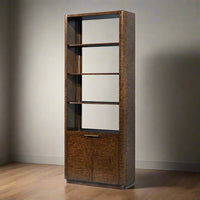 Burl wood bookcase in room, warm lighting, angled view.