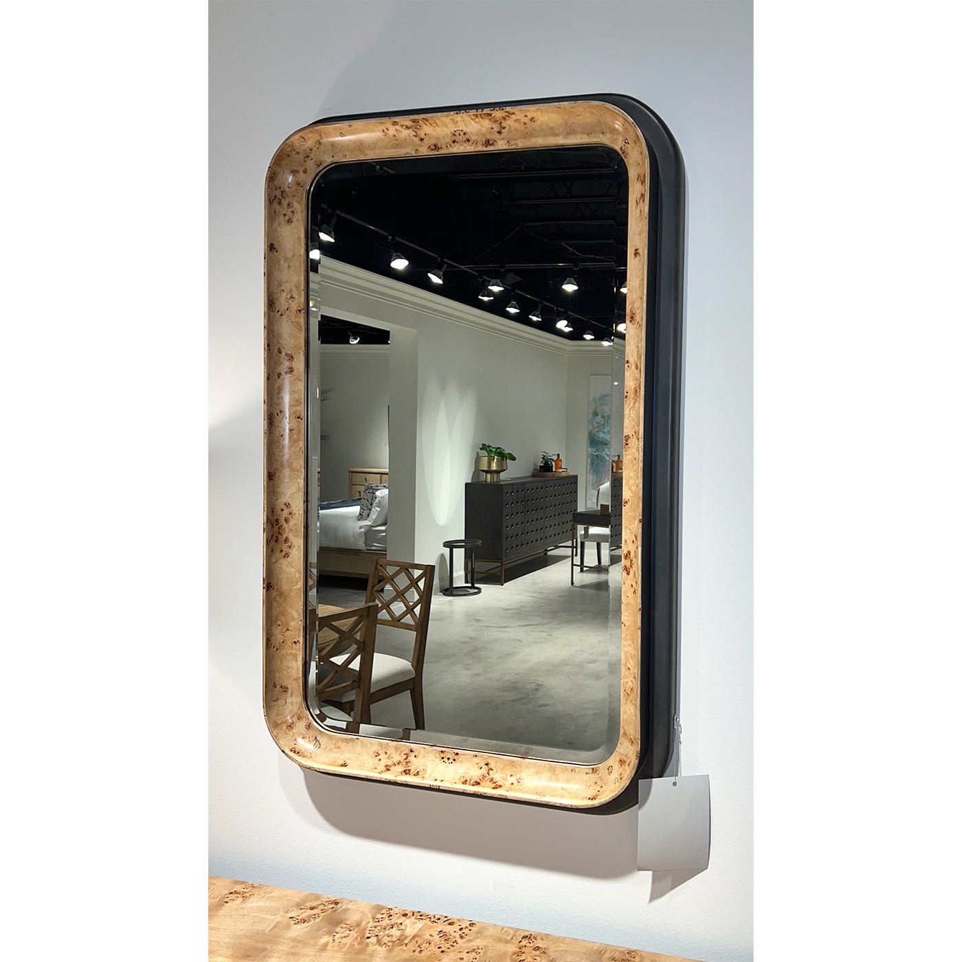 Mirror angled view showing reflection in art deco style.