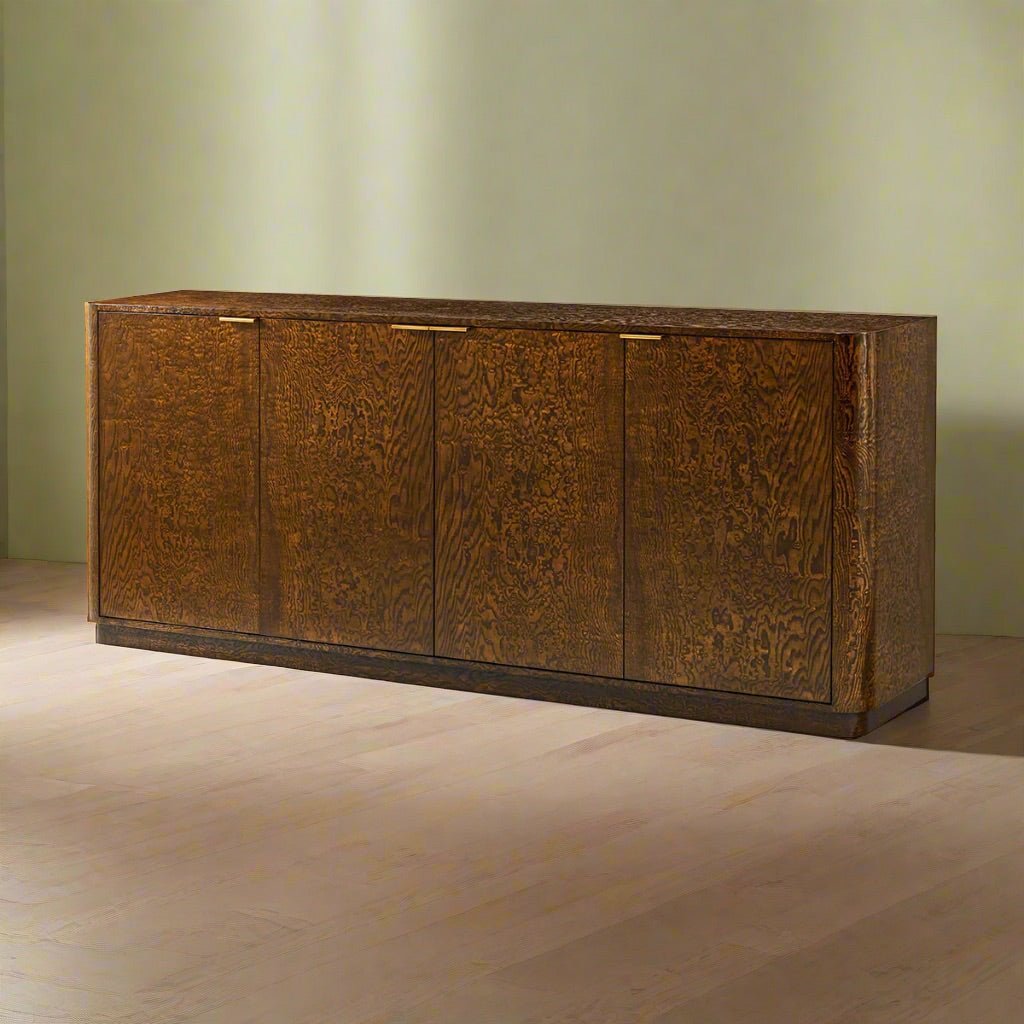 Burl wood sideboard in room, angled shot.