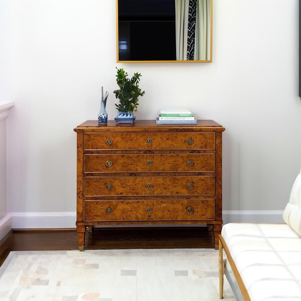 Burl wood chest in modern living room setting.
