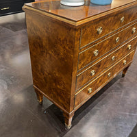 Burl wood chest side detail and surface decor.