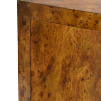 Burl wood end table, textured surface close-up.