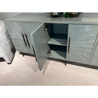 Open media cabinet showing interior shelves.