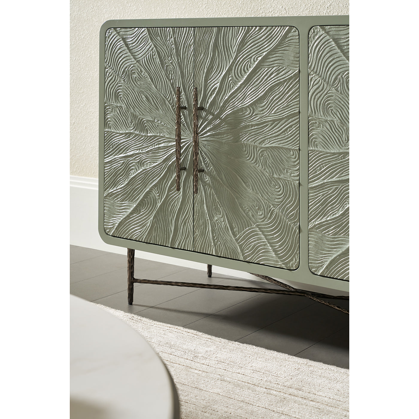 Close-up of cabinet corner with unique texture design.