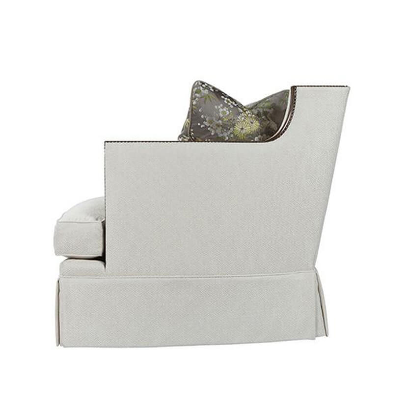Side view of Callisto upholstered sofa with pillow detail.