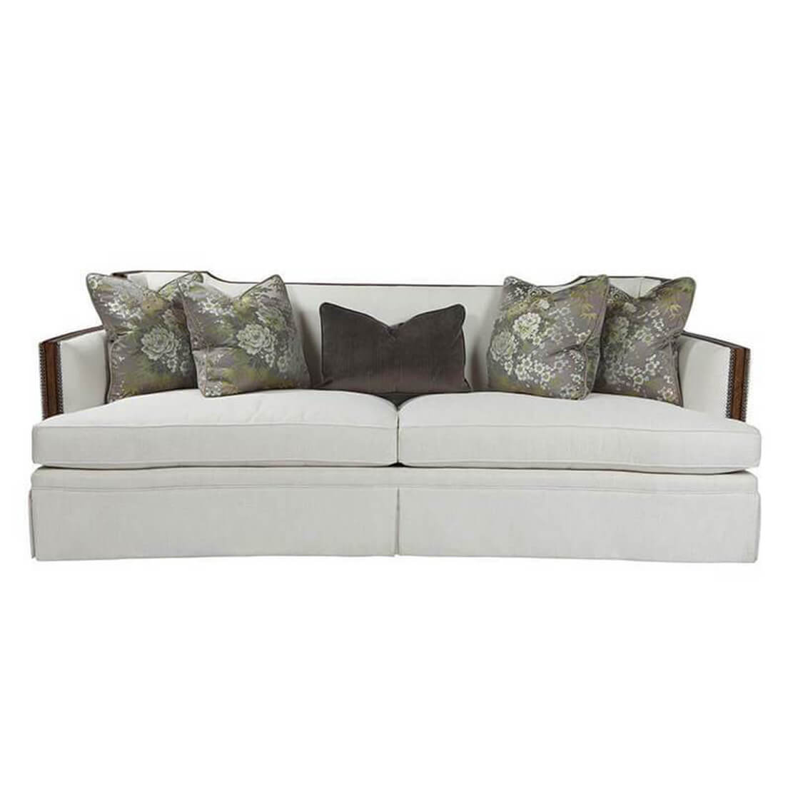 Front view of Callisto sofa, floral and solid pillows.
