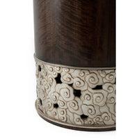 Close-up of accent table intricate base design.