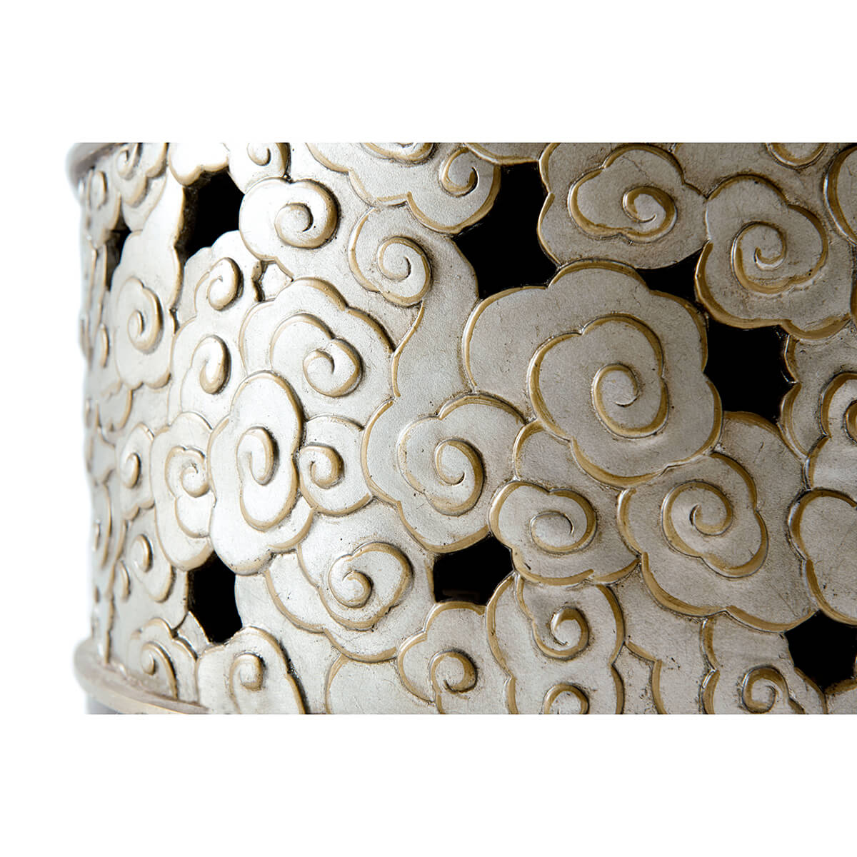 Detailed carving on accent table base.