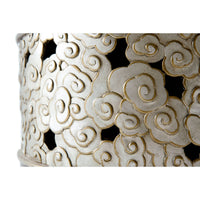 Detailed carving on accent table base.