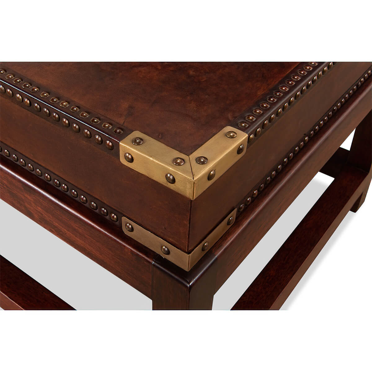 Detailed side view, leather coffee table, nailhead trim.