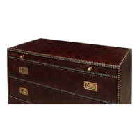Close-up, upper section, brown campaign dresser top drawers.