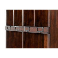 Close-up of cubbyhole details on campaign bookcase.