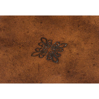 Decorative emblem on campaign desk surface.