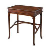 Closed campaign style desk with elegant wood finish.