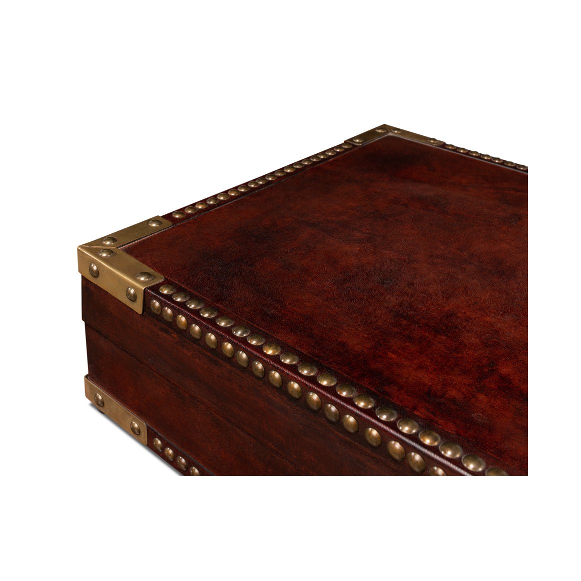 Close-up of campaign style leather box corner details.