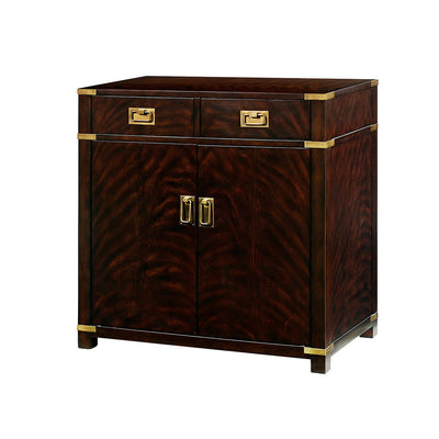 Front view of campaign style mahogany cabinet with drawers.