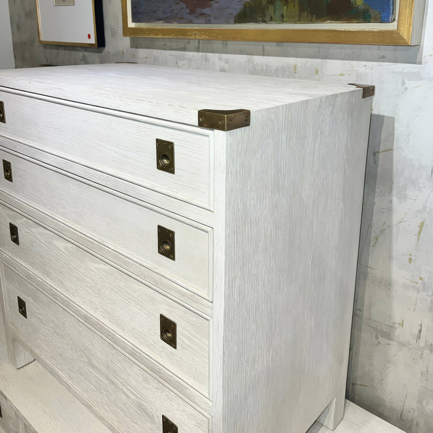 White oak nightstand showing detailed brass accents.