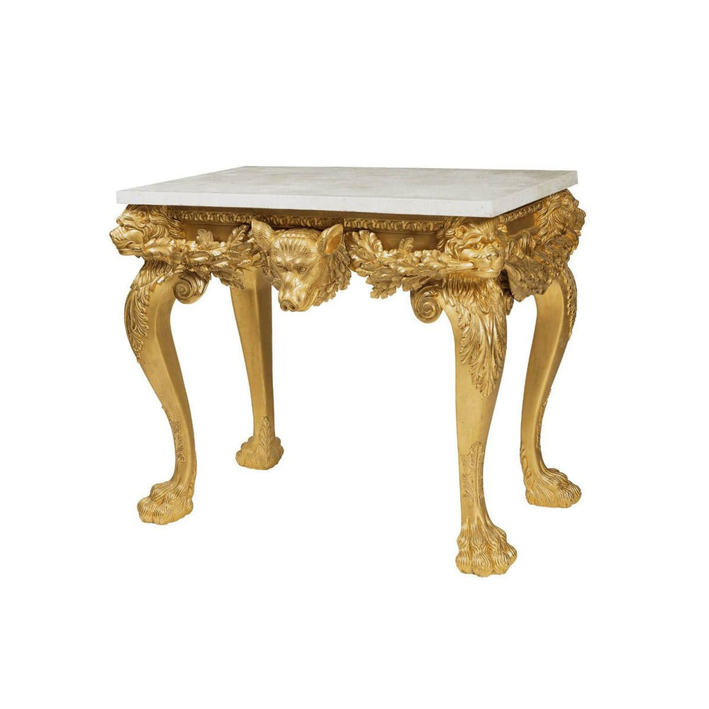 Ornate giltwood console table with animal motifs and marble top.