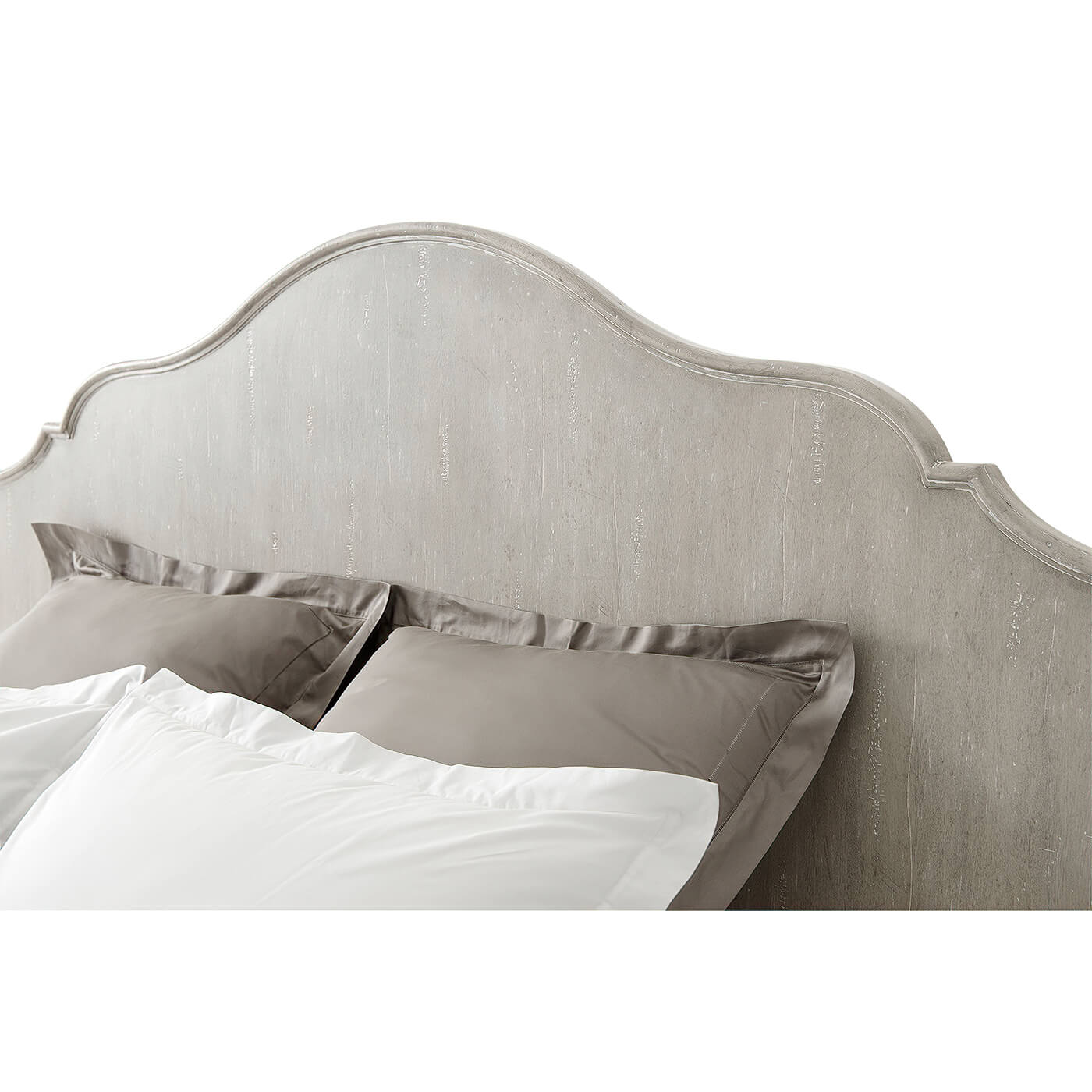 Detailed headboard of king size four poster bed.