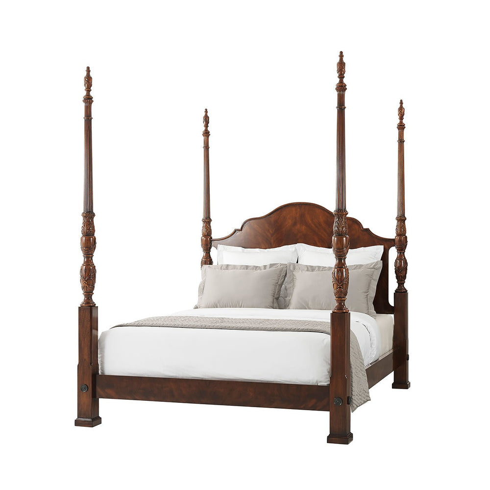 Carved mahogany four post bed full view.