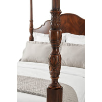 Detailed carving on mahogany bedpost.