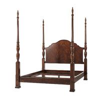Empty bed frame with four posts.