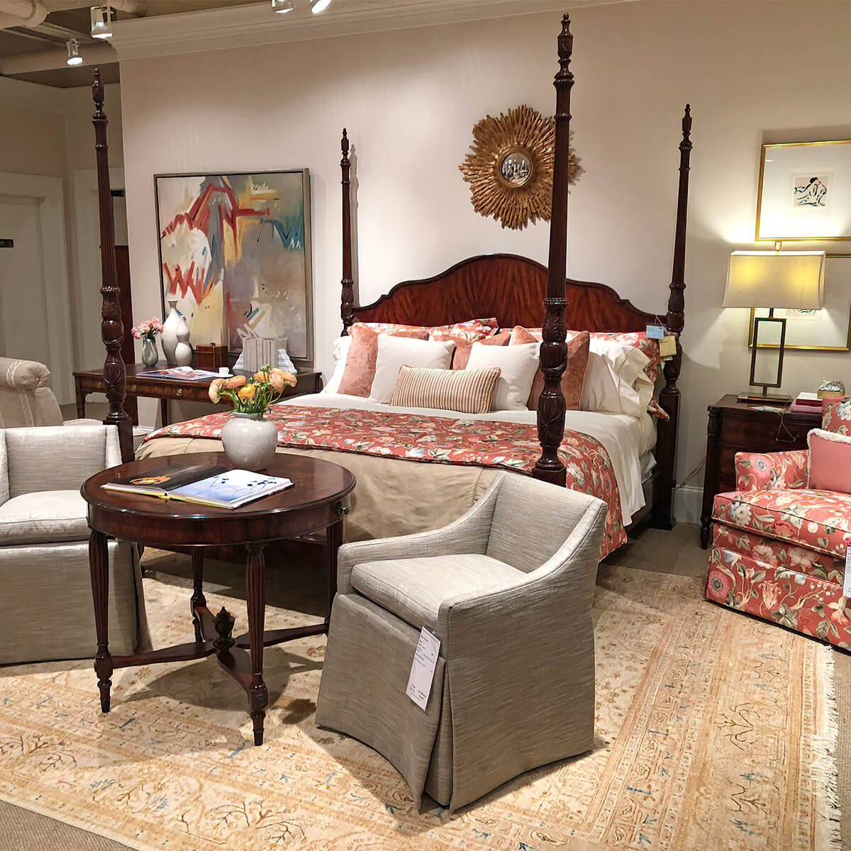 Elegant bedroom setup with mahogany four post bed.