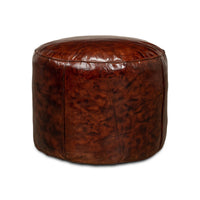 Brown leather round stool front view, polished finish.