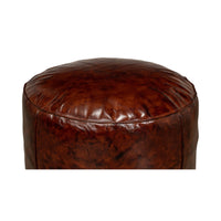 Close-up top view of brown leather stool.