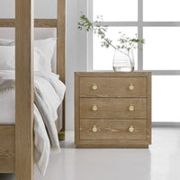 Cerused oak bedside chest in bedroom setting with decor.