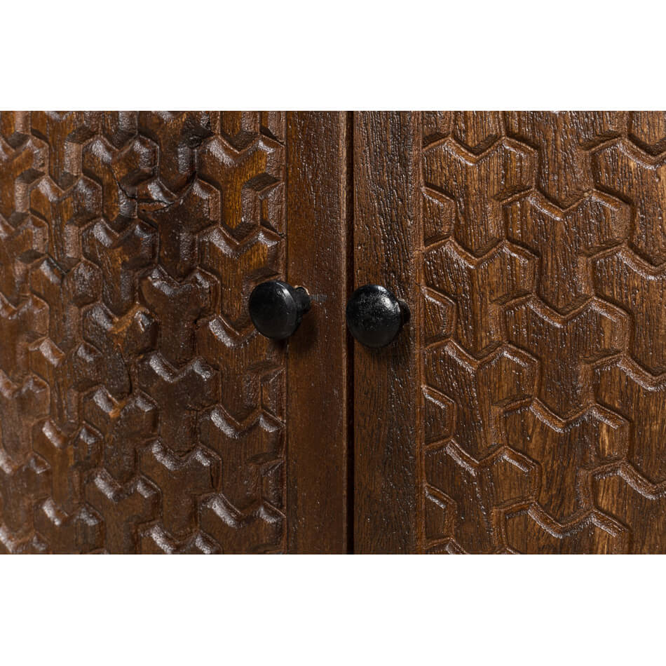 Detailed close-up of sideboard door knobs and texture.