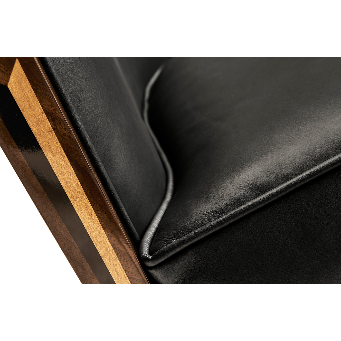 Art Deco chair close-up, leather cushion and wood frame.