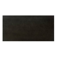 Top-down view of charcoal desk surface, modern finish.