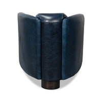 Blue leather club chair, back view.