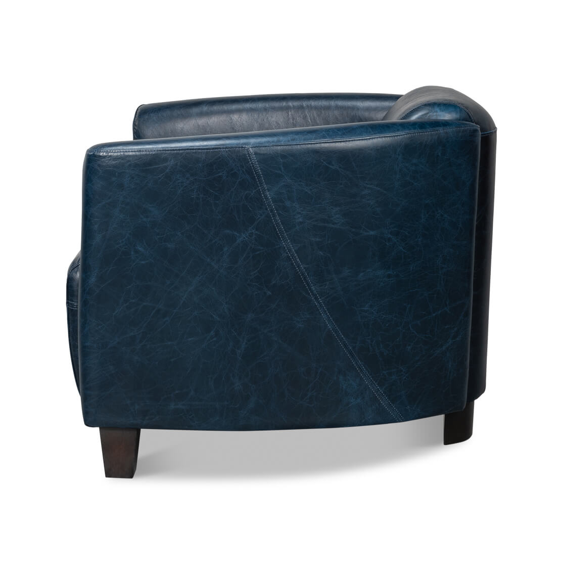 Blue leather club chair, side profile.