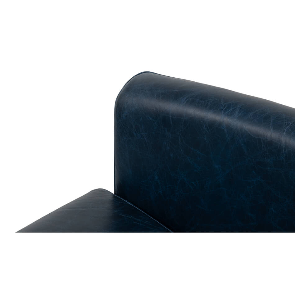 Close-up, top edge detail on club chair.