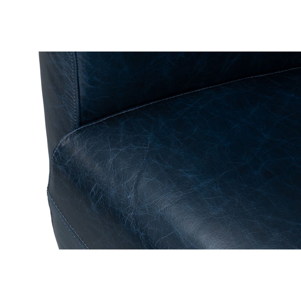 Close-up, seat detail on club chair.