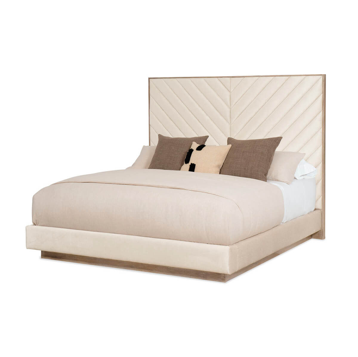 Angled view of chevron tufted upholstered queen bed.