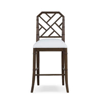 Chippendale counter stool front view with geometric backrest.