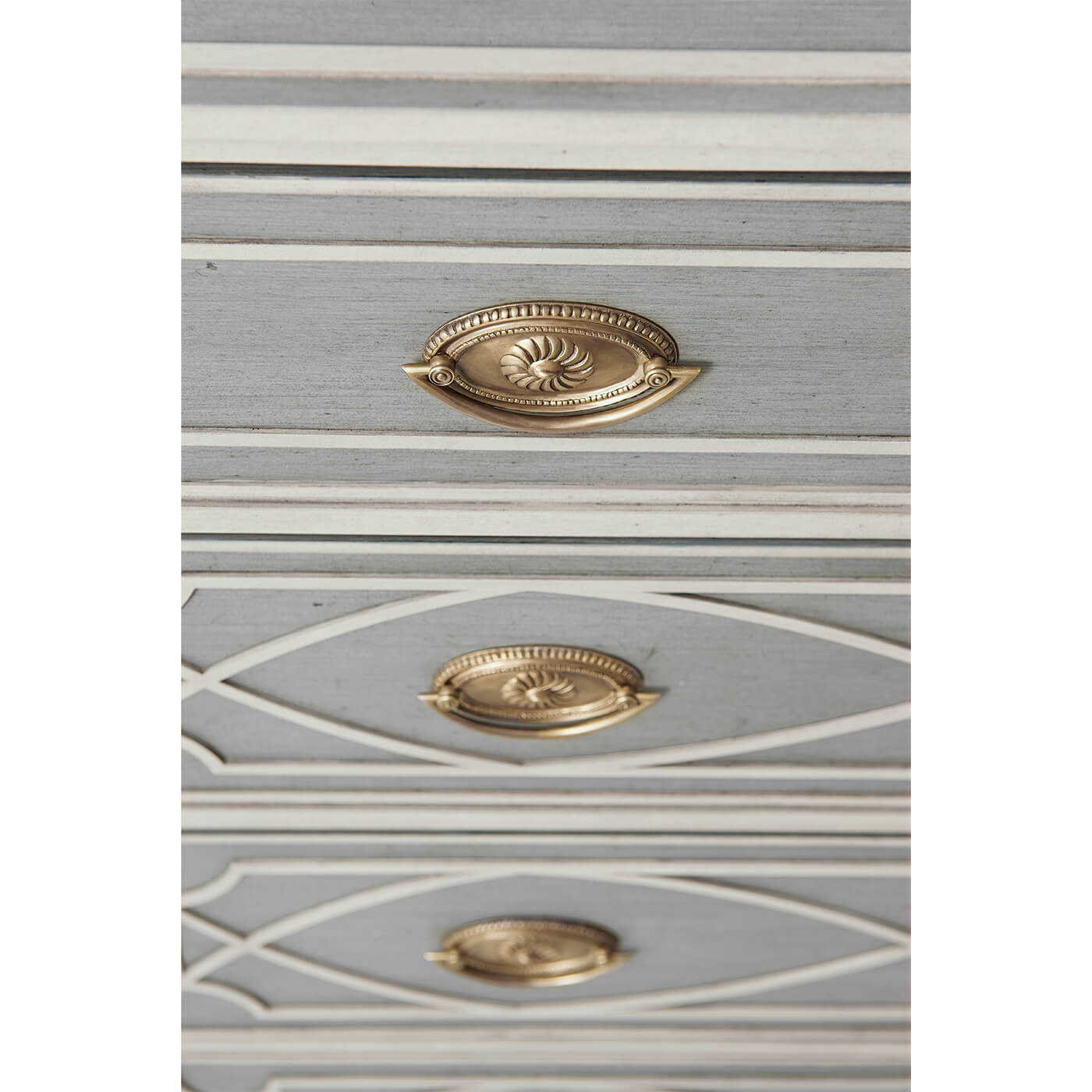 Close-up of drawer handle on Chinese Chippendale chest.