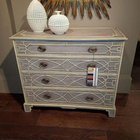 Chinese Chippendale painted chest styled with decorative vases.
