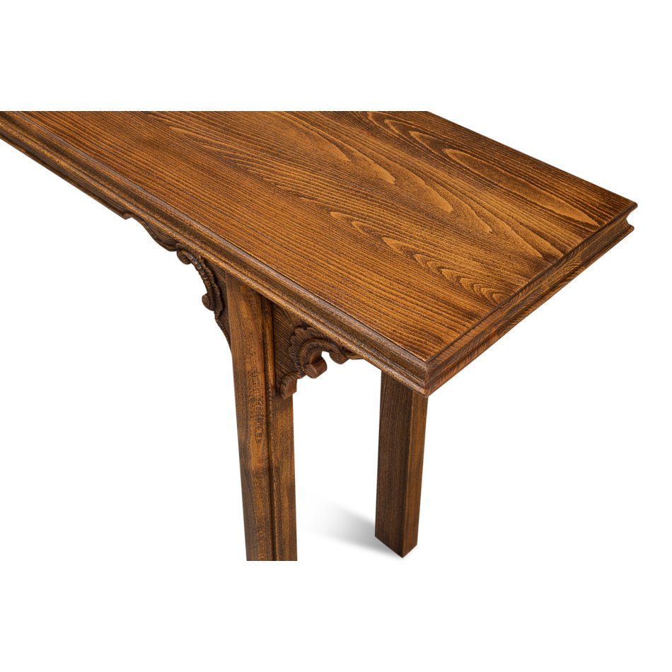 Close-up of wood texture on console table surface.