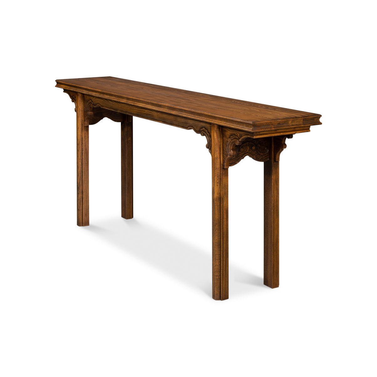 Angled view of carved console highlighting intricate leg detail.
