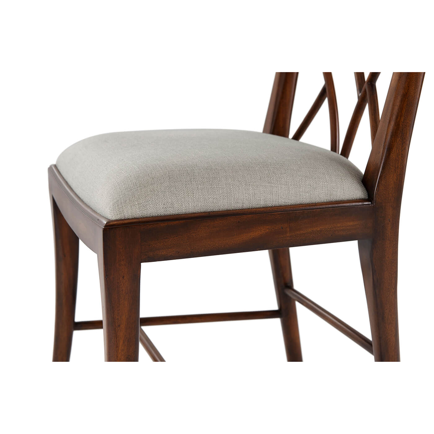 Chinoiserie dining chair seat detail with soft cushion.