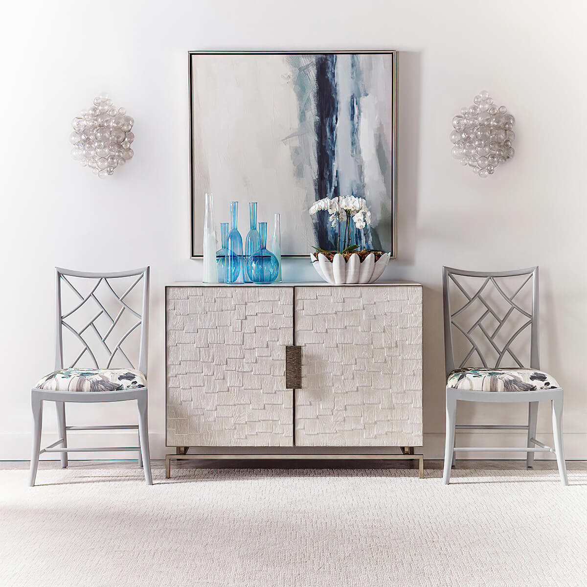 Chinoiserie dining chairs in stylish modern room setting.