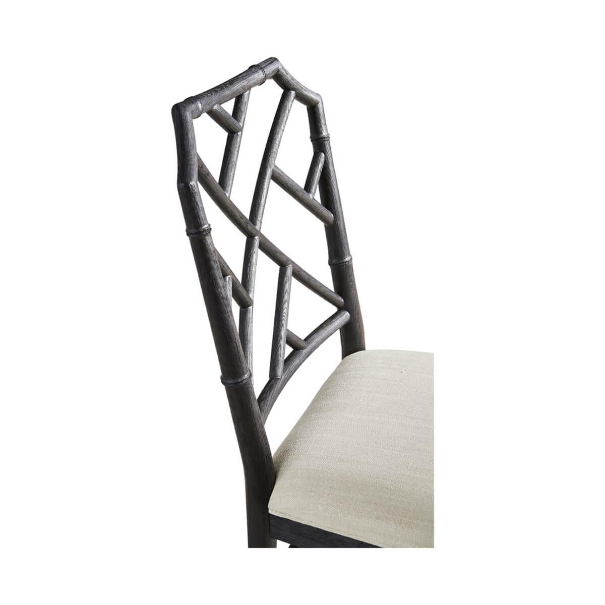 Close-up of ebonized bamboo chair back detail.
