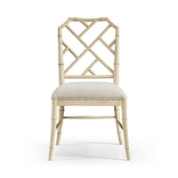 Front view of Chippendale bamboo dining chair, light oak.